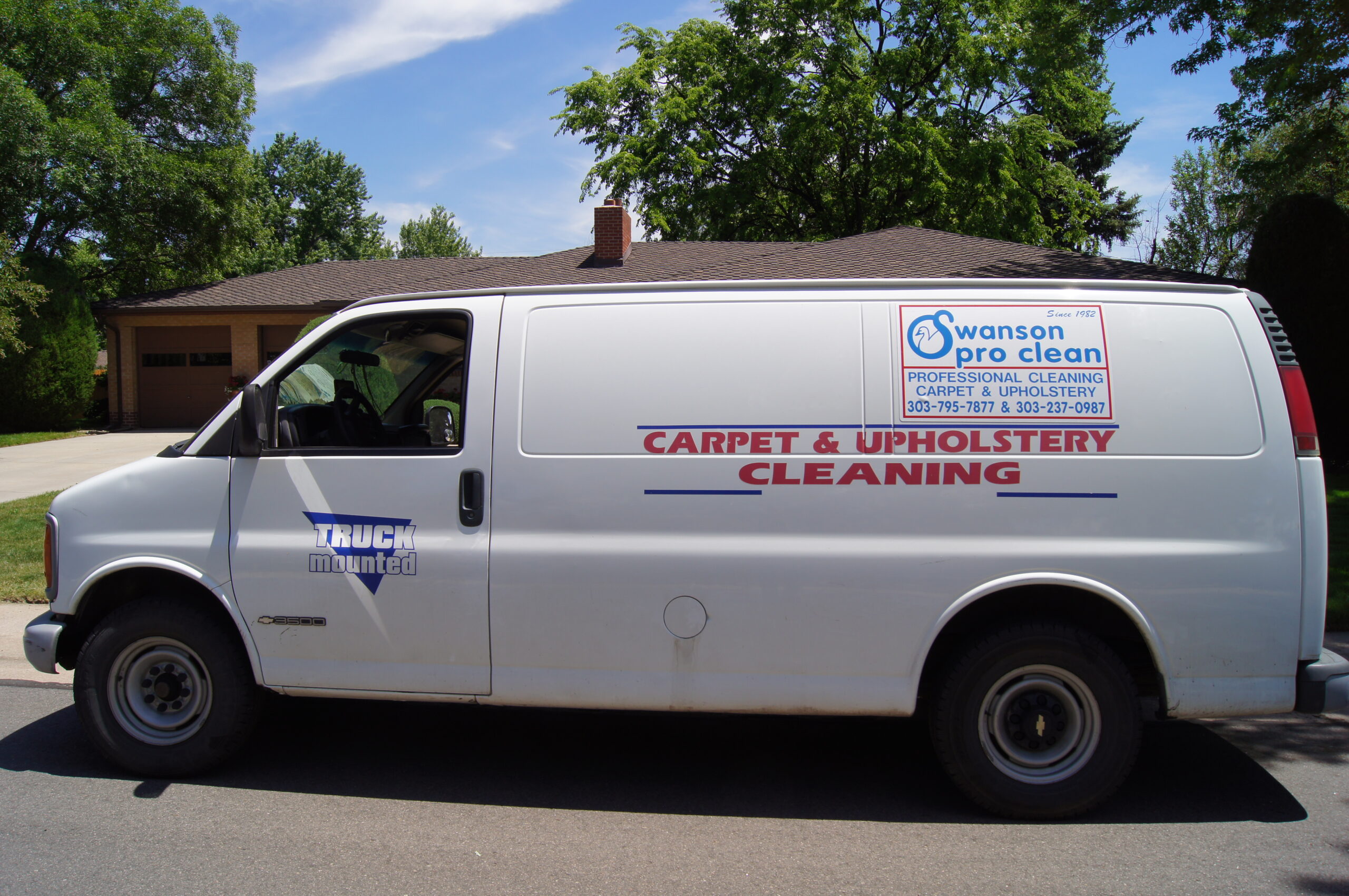 A Truck Mounted Swanson Pro clean Van. Phone: 303-237-0987 magnetic sign with vinyl decals.